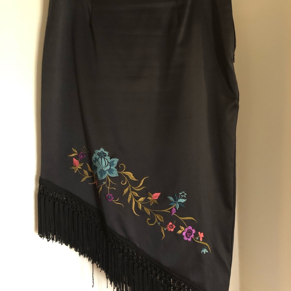 Black silk skirt, size 8 but more a 6